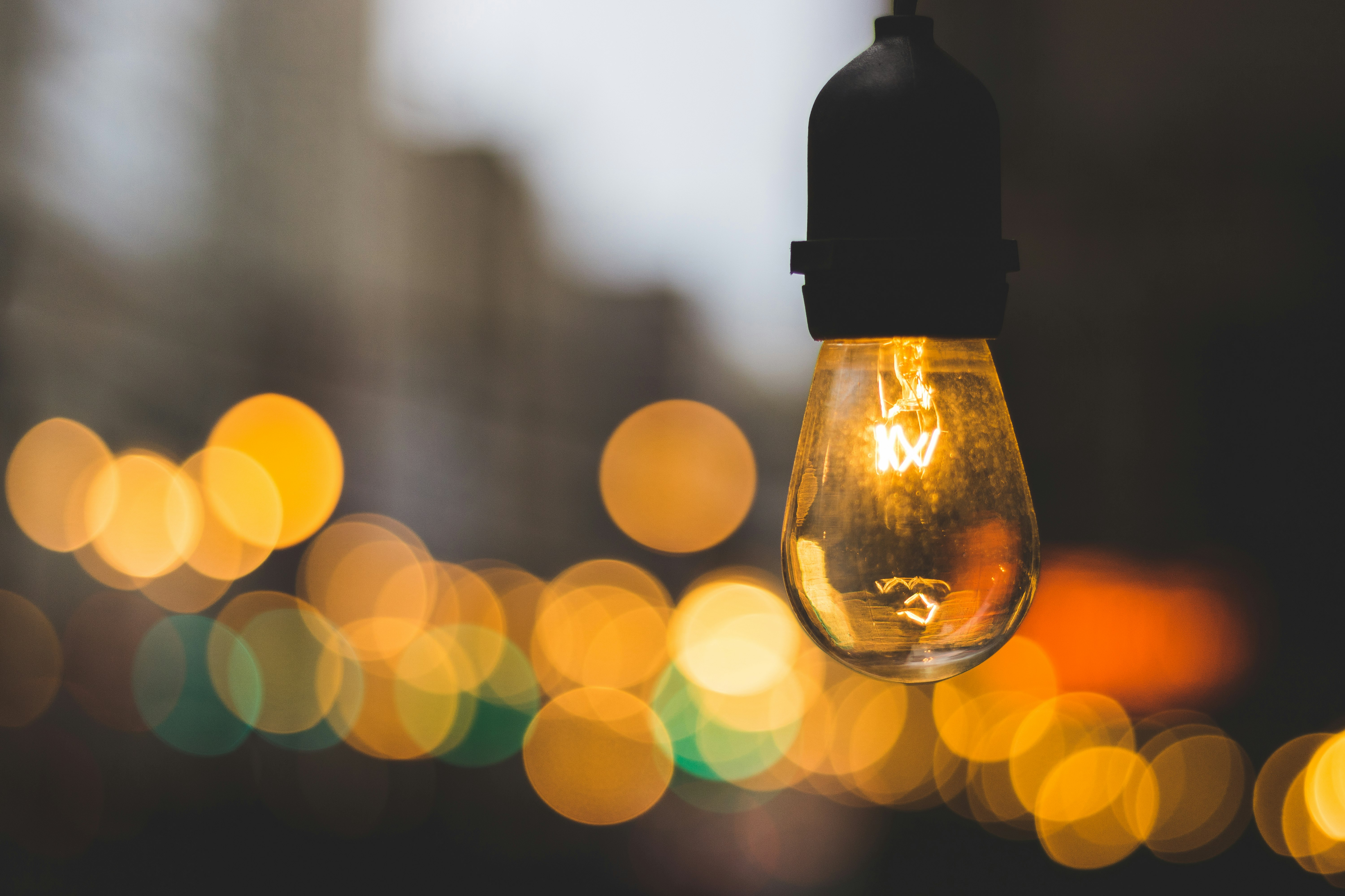 macro photography of yellow light bulb